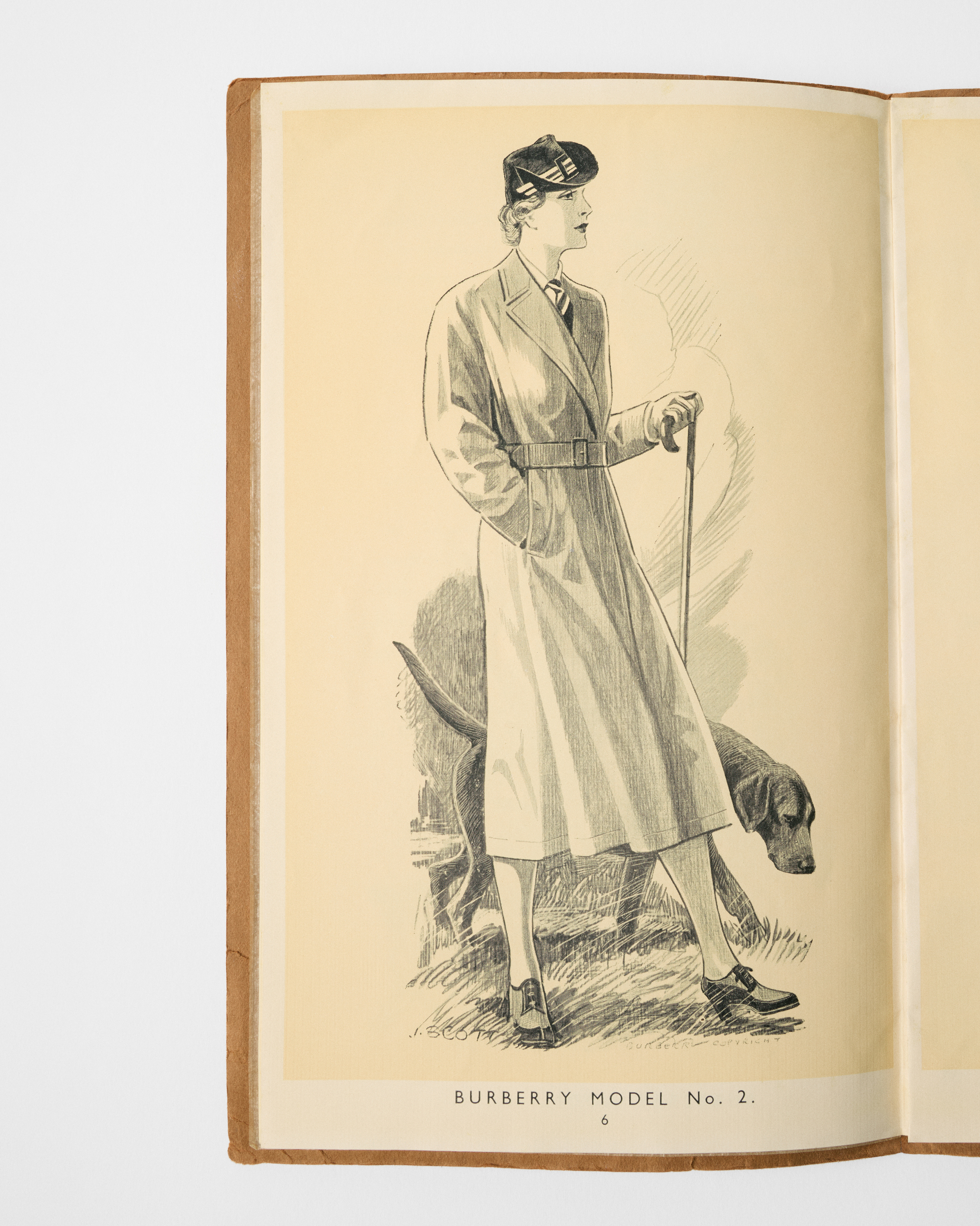 A womenswear catalogue featuring Burberry trench 