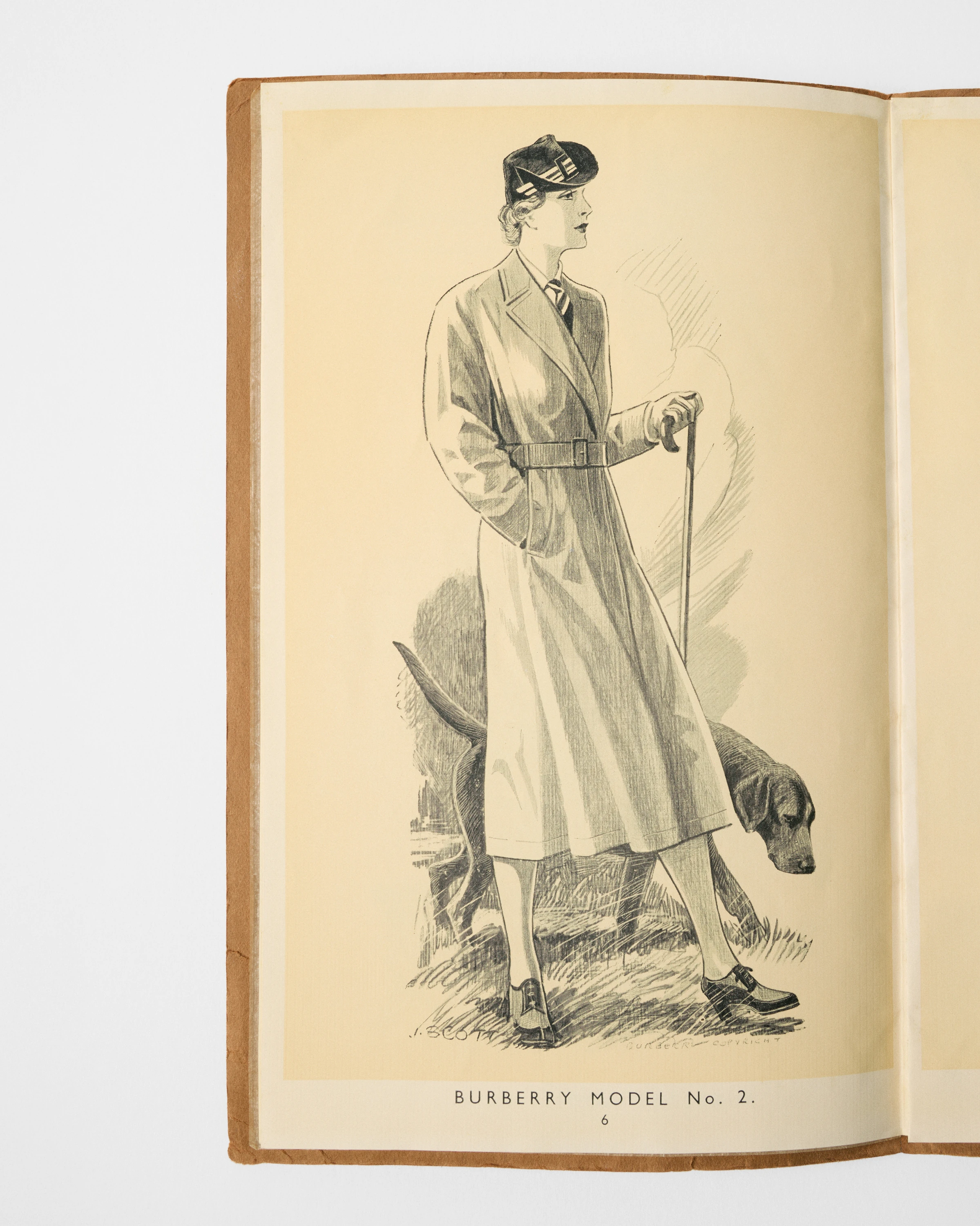 A womenswear catalogue featuring Burberry trench 