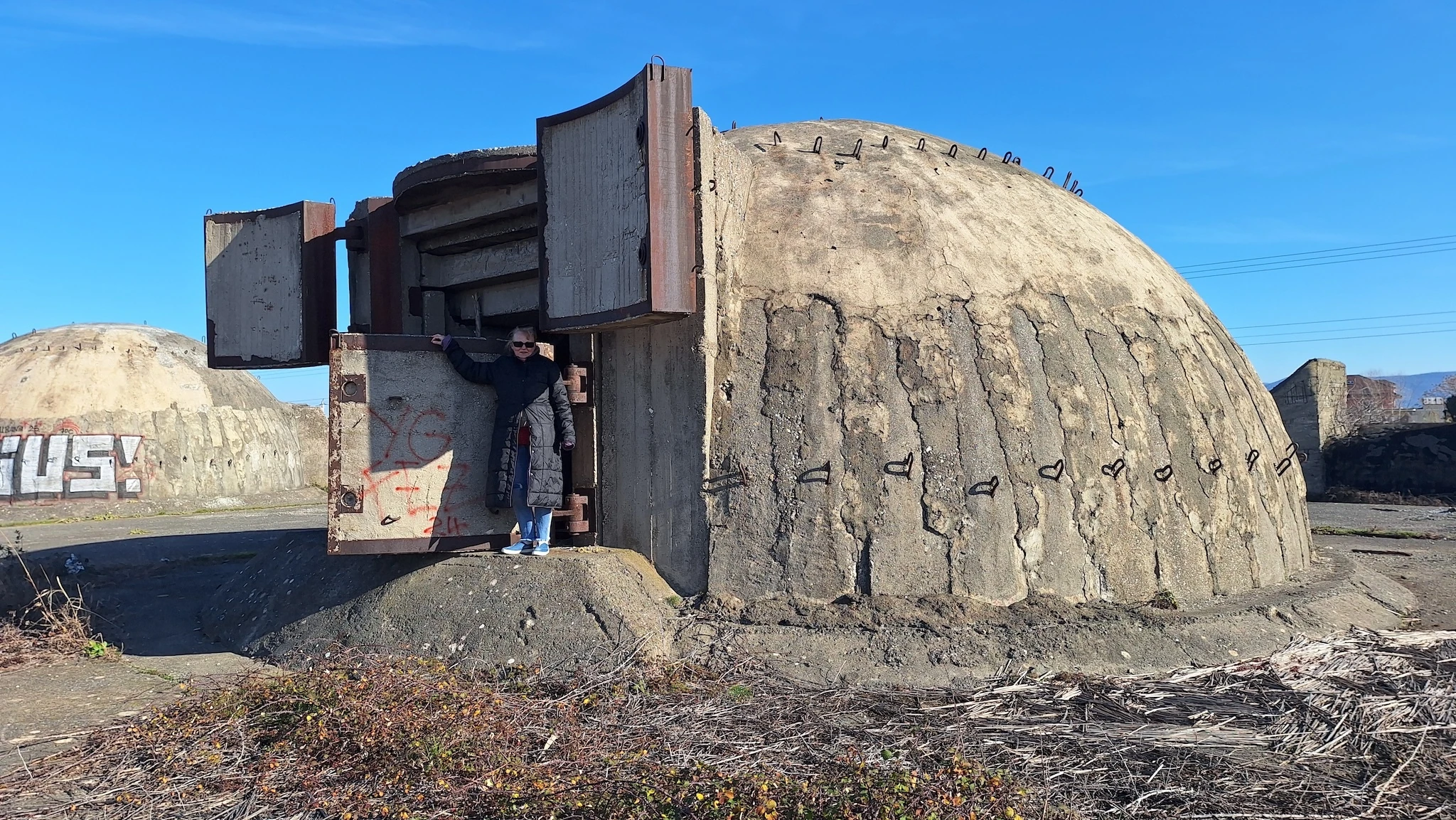 Heidi at one of Albania&rsquo;s many Cold War bunkers
