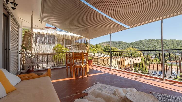The Greek island apartment with a sunny terrace The Greek island apartment with a sunny terrace