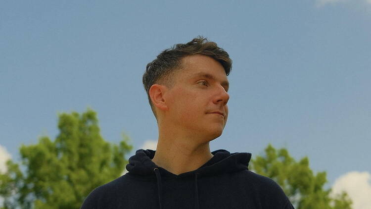 A close-up of a person looking into the distance outdoors A close-up of a person looking into the distance outdoors