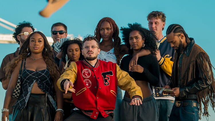 A group of people posing together outdoors