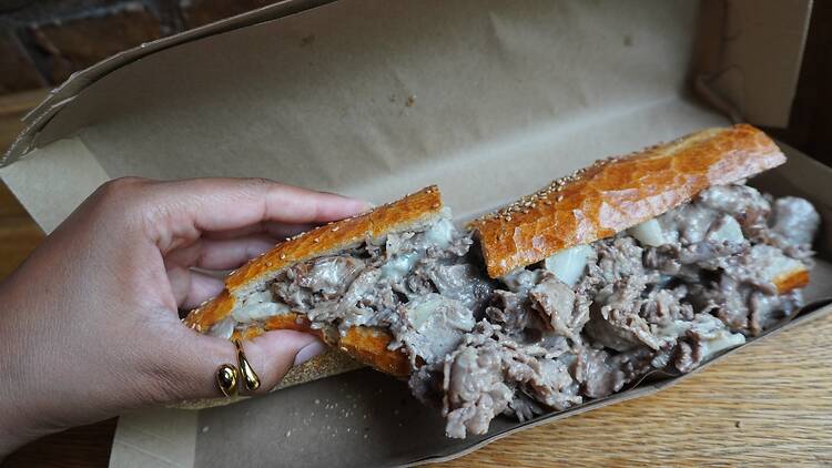 A Philly cheesesteak sandwich
