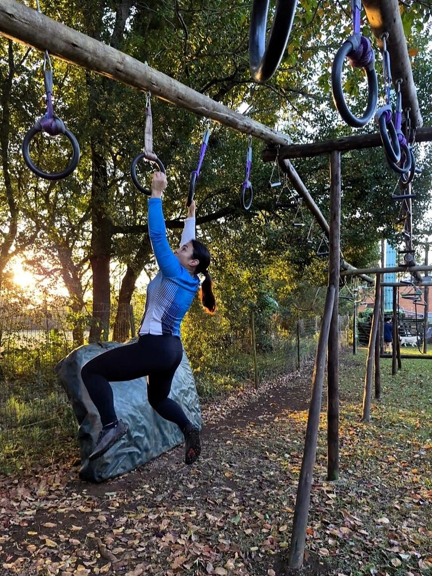 Athletes combine endurance, speed, strength, balance and problem-solving while tackling technical obstacles, heavy carries, climbing rigs, and challenging terrain.
