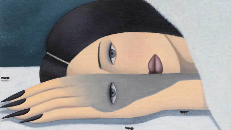 A close-up of a painting of a person resting their head on a table with ants nearby.