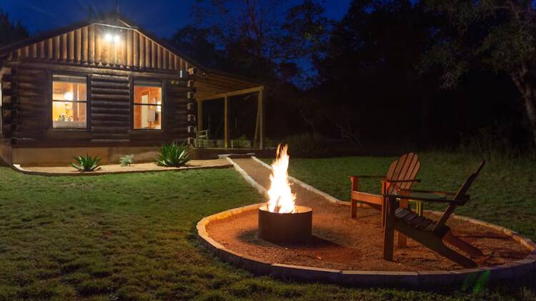 The log cabin in the Wimberley outskirts The log cabin in the Wimberley outskirts