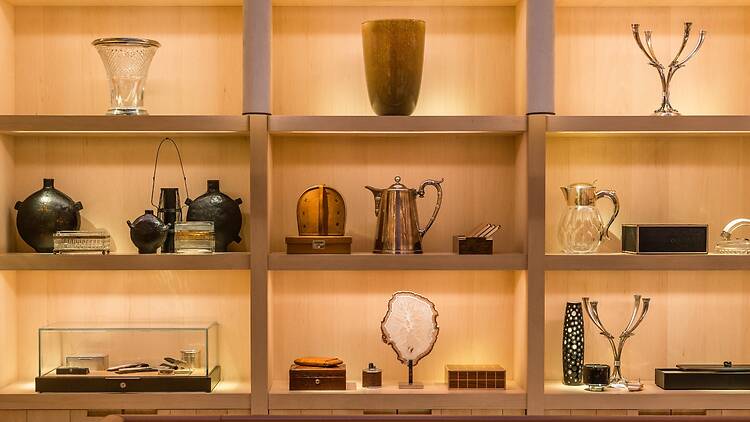 Shelves of art objects at Connolly in Mayfair
