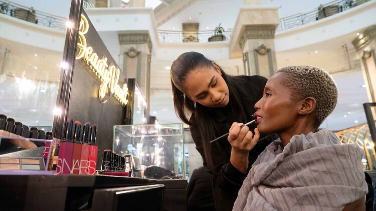 Make up artist Kelly Robertson applies make up to China Shabalala. Make up artist Kelly Robertson applies make up to China Shabalala.