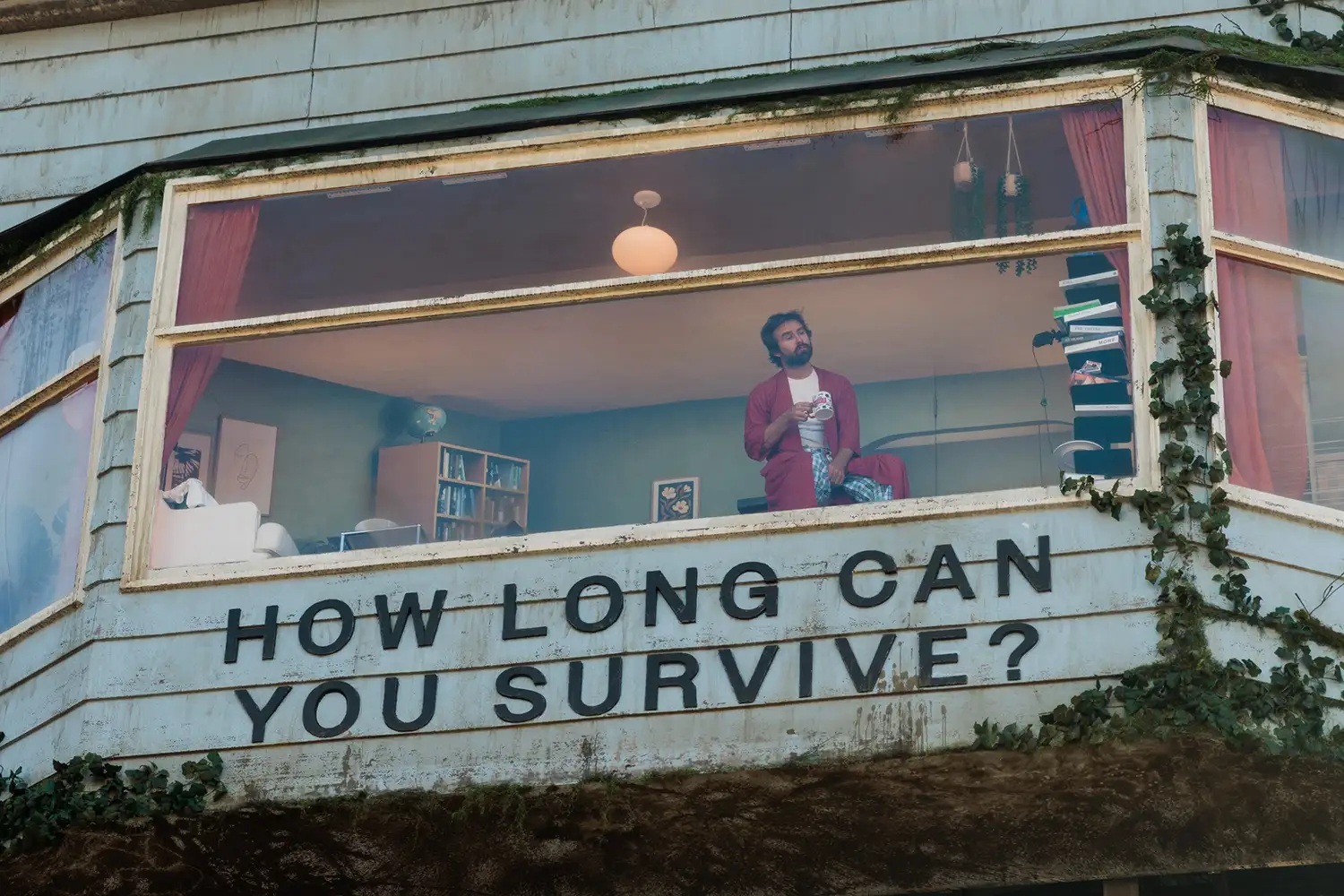 Yes, that is a real, live human trapped inside a Netflix billboard over Sunset Boulevard—here's why