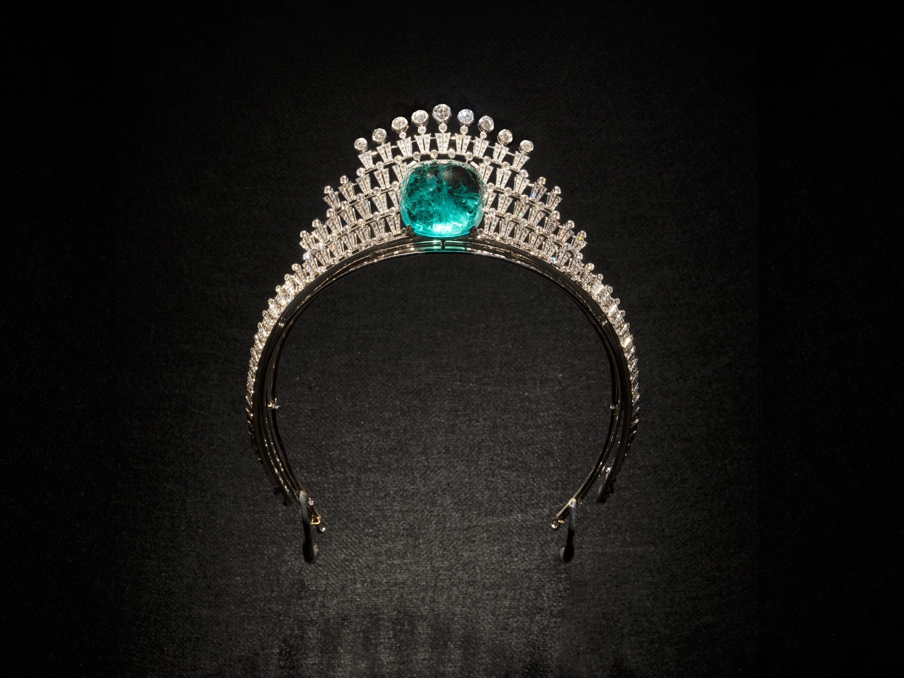 Crown with green jewel