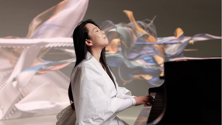 Performance of Phillip Glass – Etudes Pianist performs a piece of music.