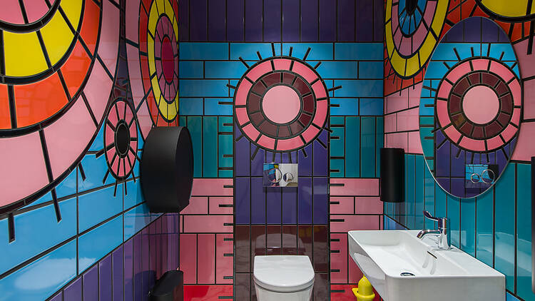 Colourful tiled toilet installation at Studio Voltaire 