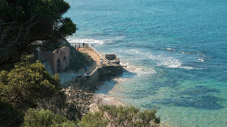 Portsea A view of the ocean from the top of a hill