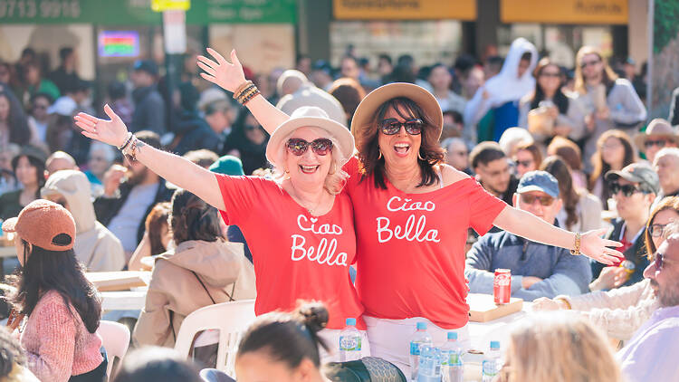 Ferragosto Two women with 'ciao bella' written on their red t-shirts
