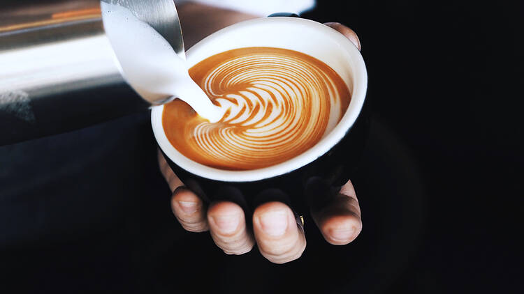Barista art in a latte coffee Barista art in a latte coffee
