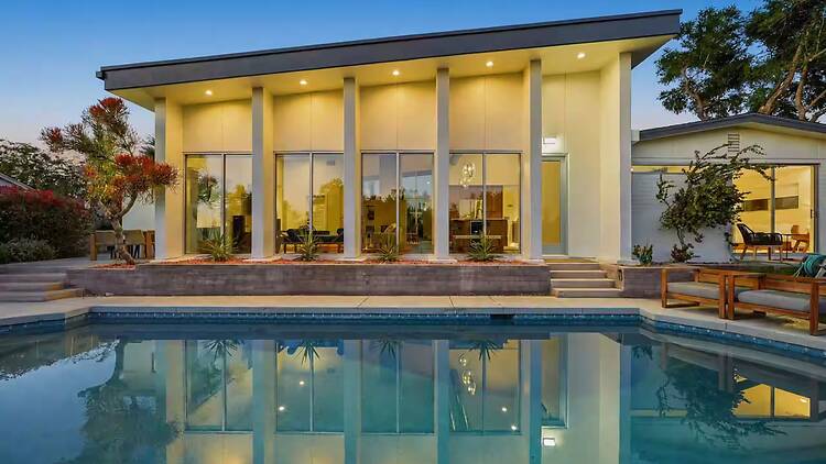 The mid-century modern retreat with a bocce court