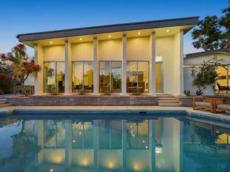 The mid-century modern retreat with a bocce court