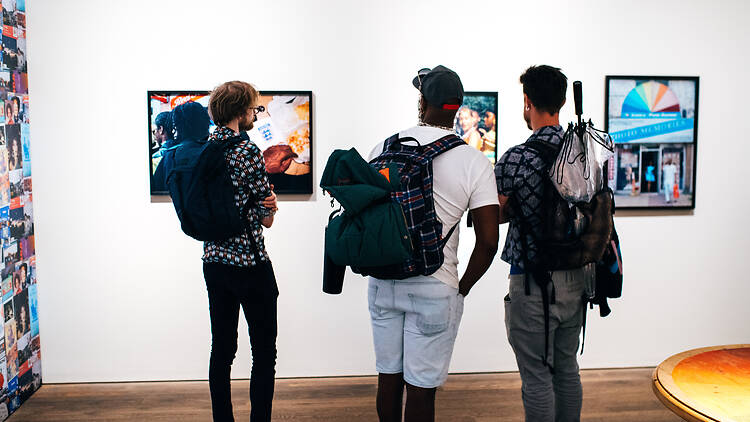People looking at a display in the Photographers’ Gallery