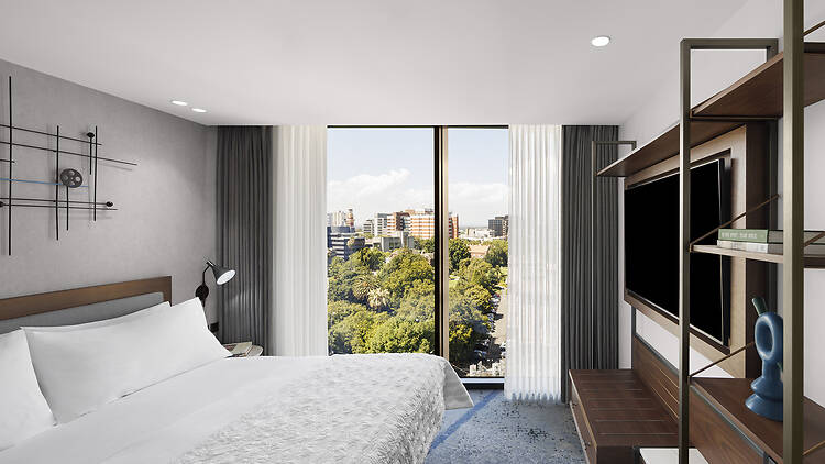 A bedroom in Le Méridien Melbourne's Palace Suite.