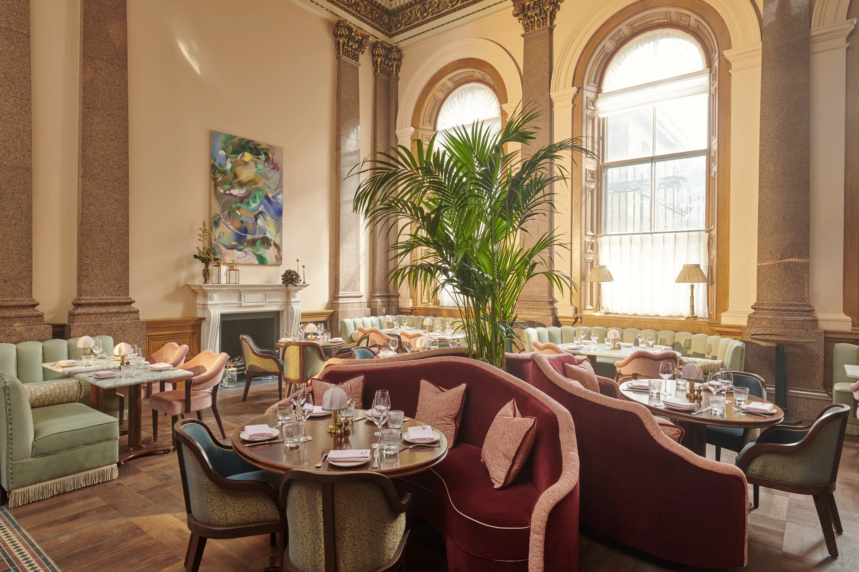 Light-filled dining room at The Spence with a plant in the centre
