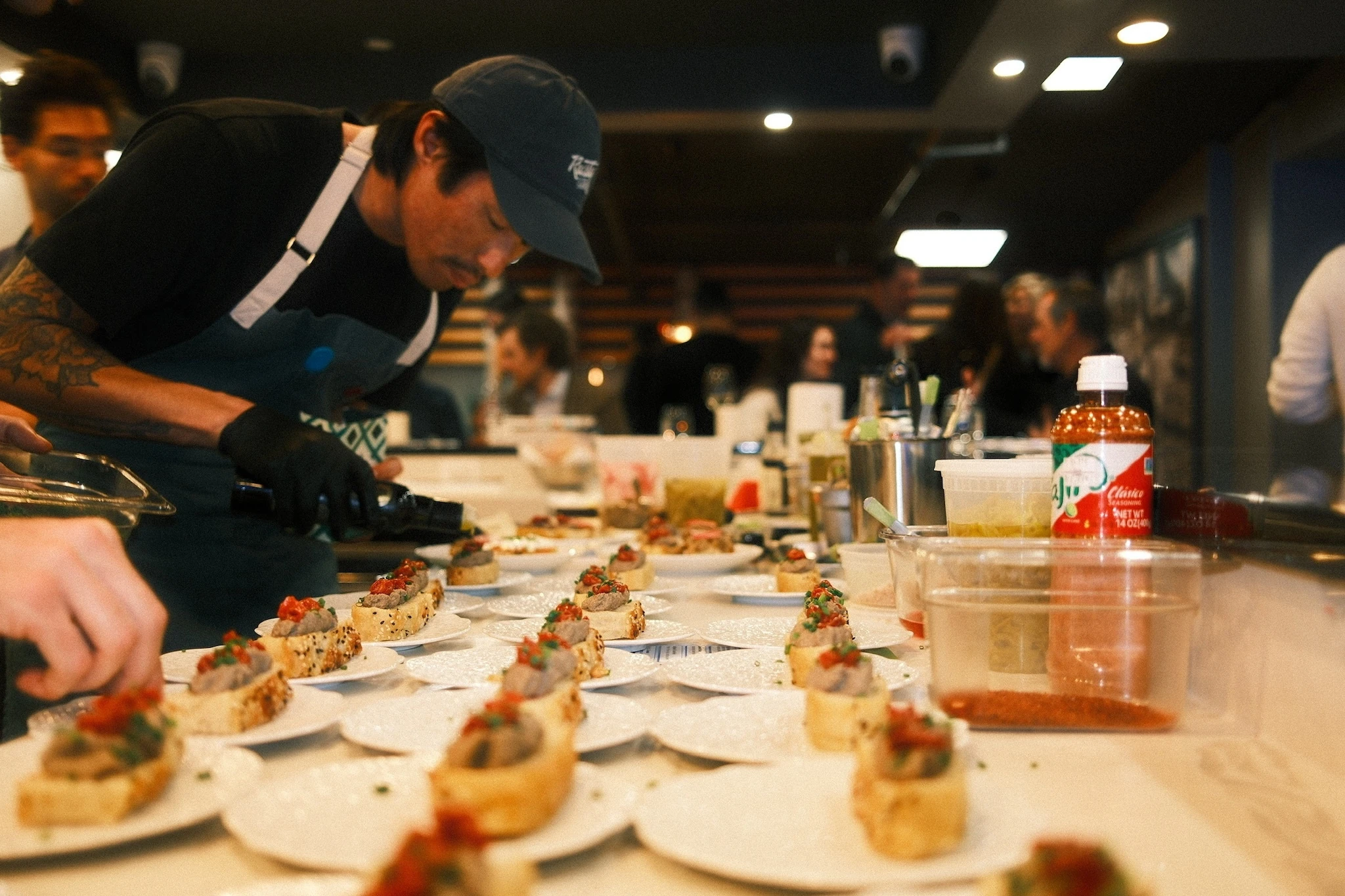 Brandon Siu of Rusty Supper Club plating a dish