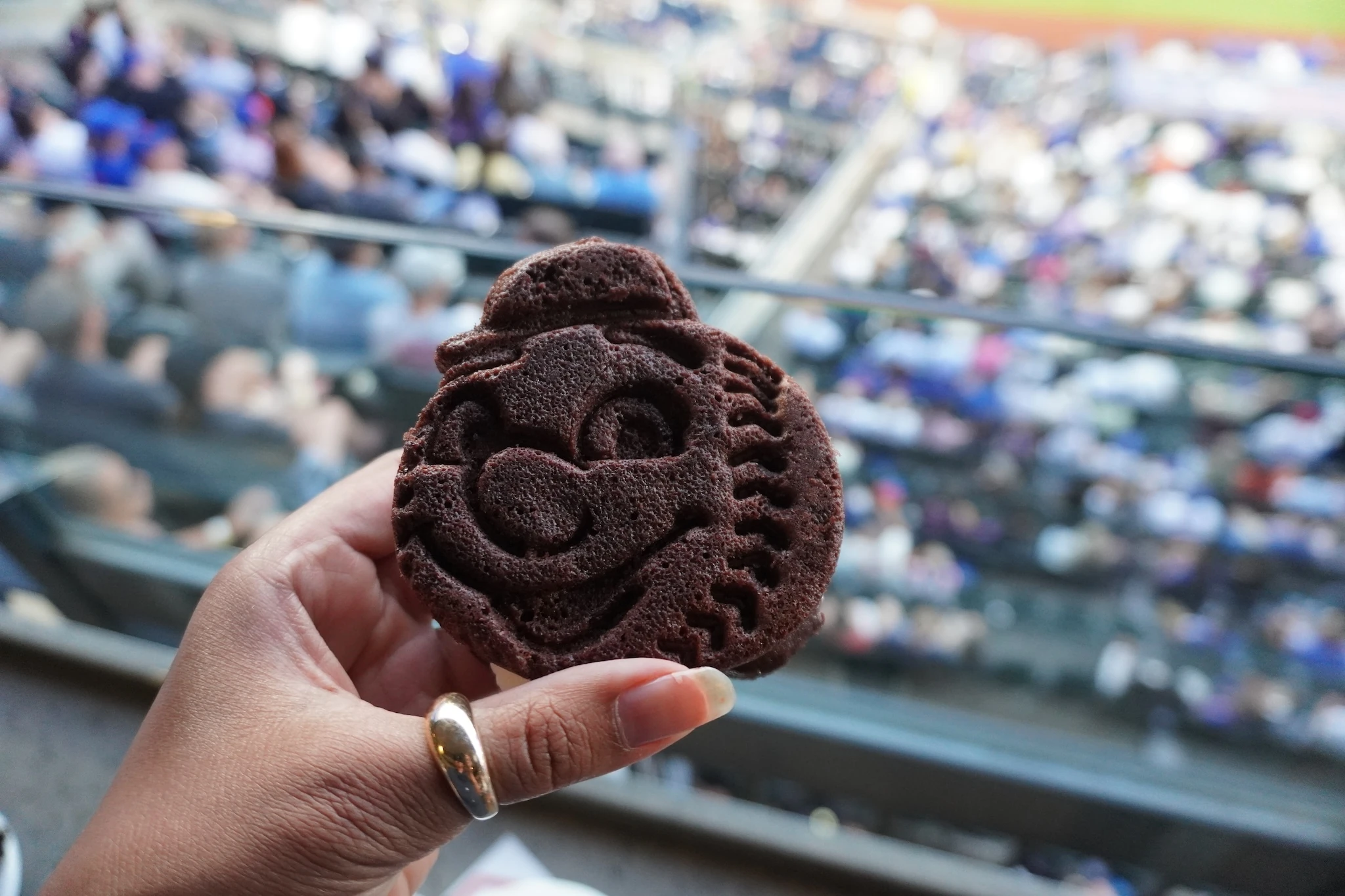 A chocolate whoopie pie in the form of Mr. Met