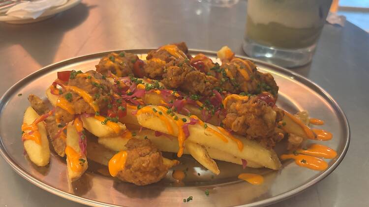 The Nashville – skin-on fries and crispy fried chicken – at Rost, Bandra