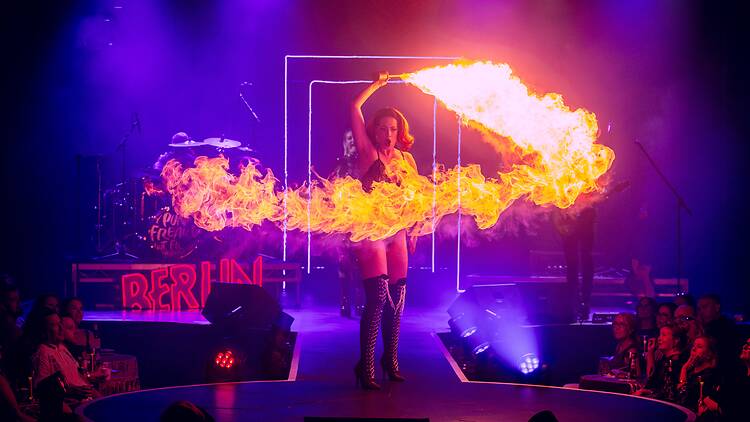 A performer wields fire in Bernie Dieter's Club Kabarett