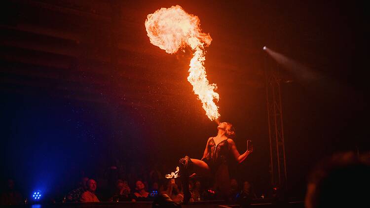A performer spits fire in Bernie Dieter's Club Kabarett