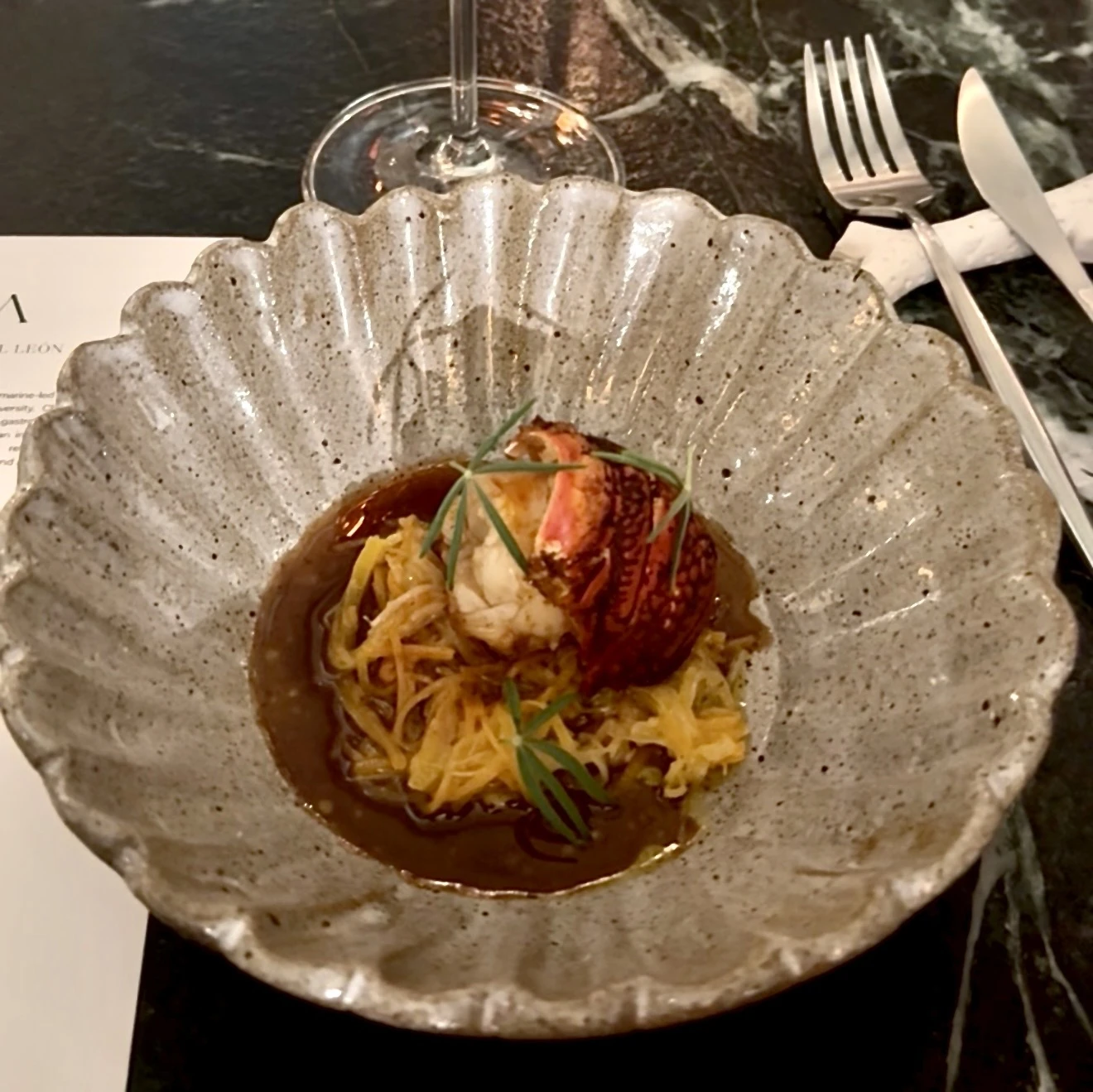 Chef Roux's signature pan-fried lobster medallion.