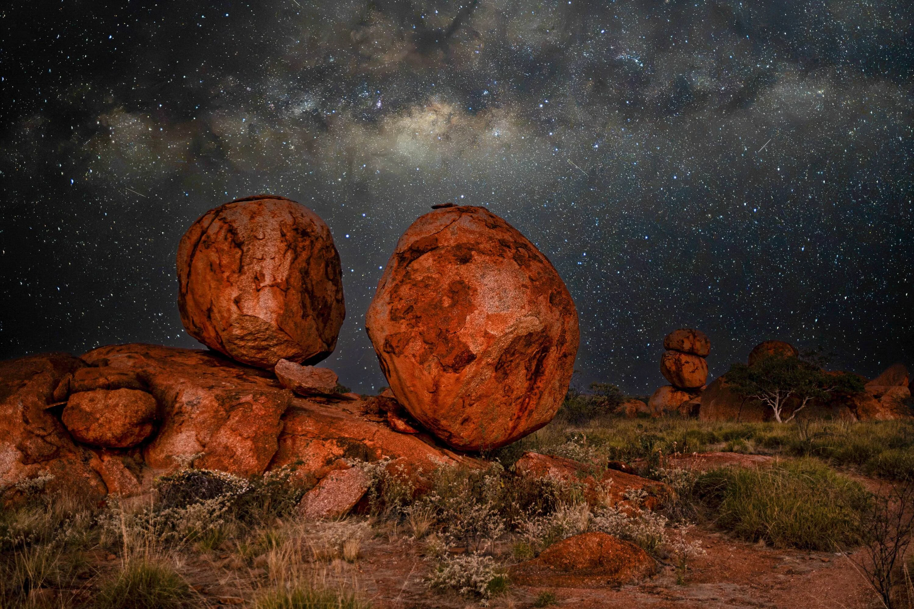 Boulders under starry sky