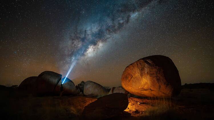Boulders under starry sky