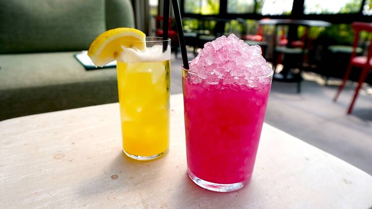 one yellow and pink cocktail at elNico Rooftop