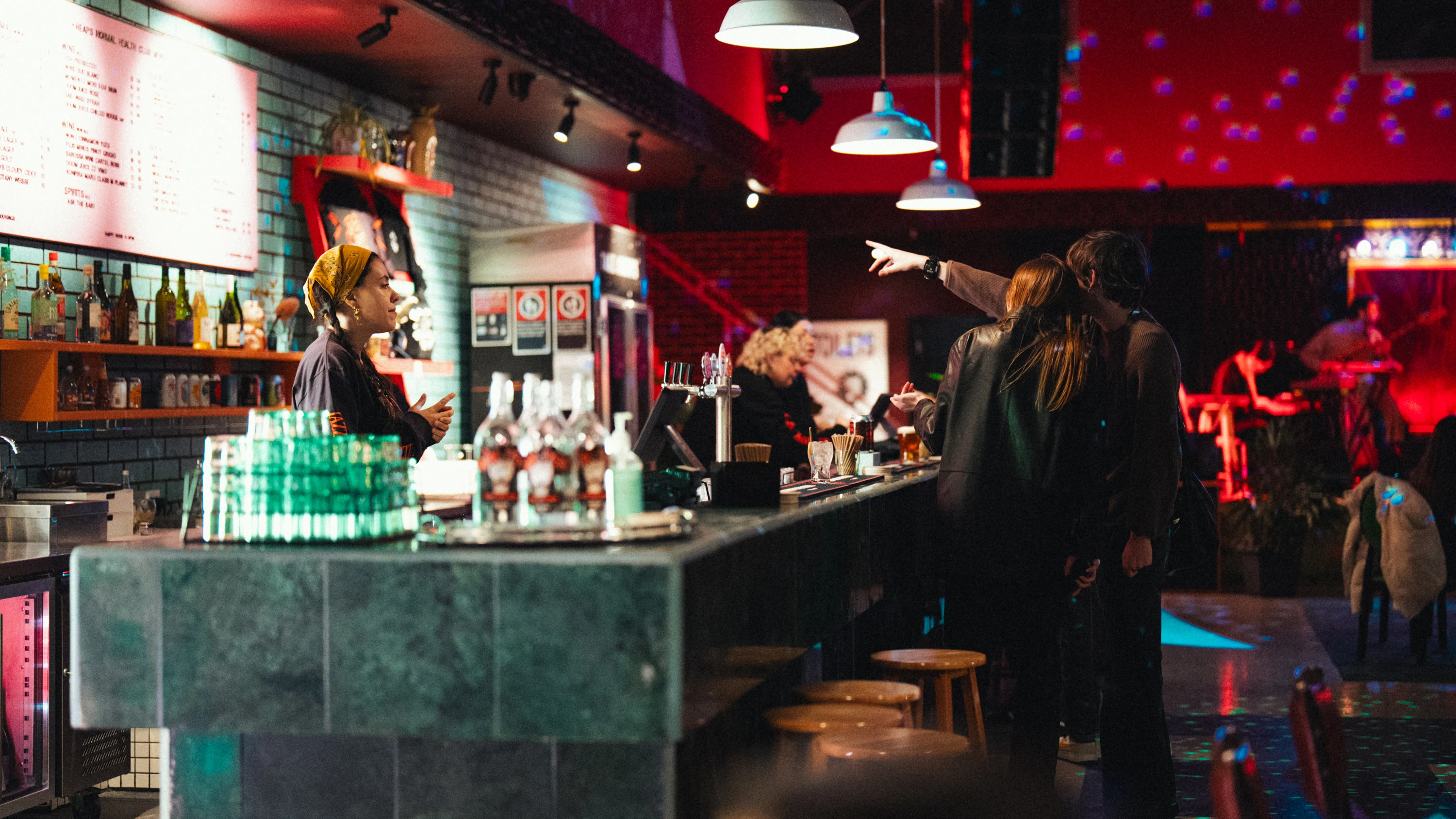 People at the bar at Heaps Normal Health Club