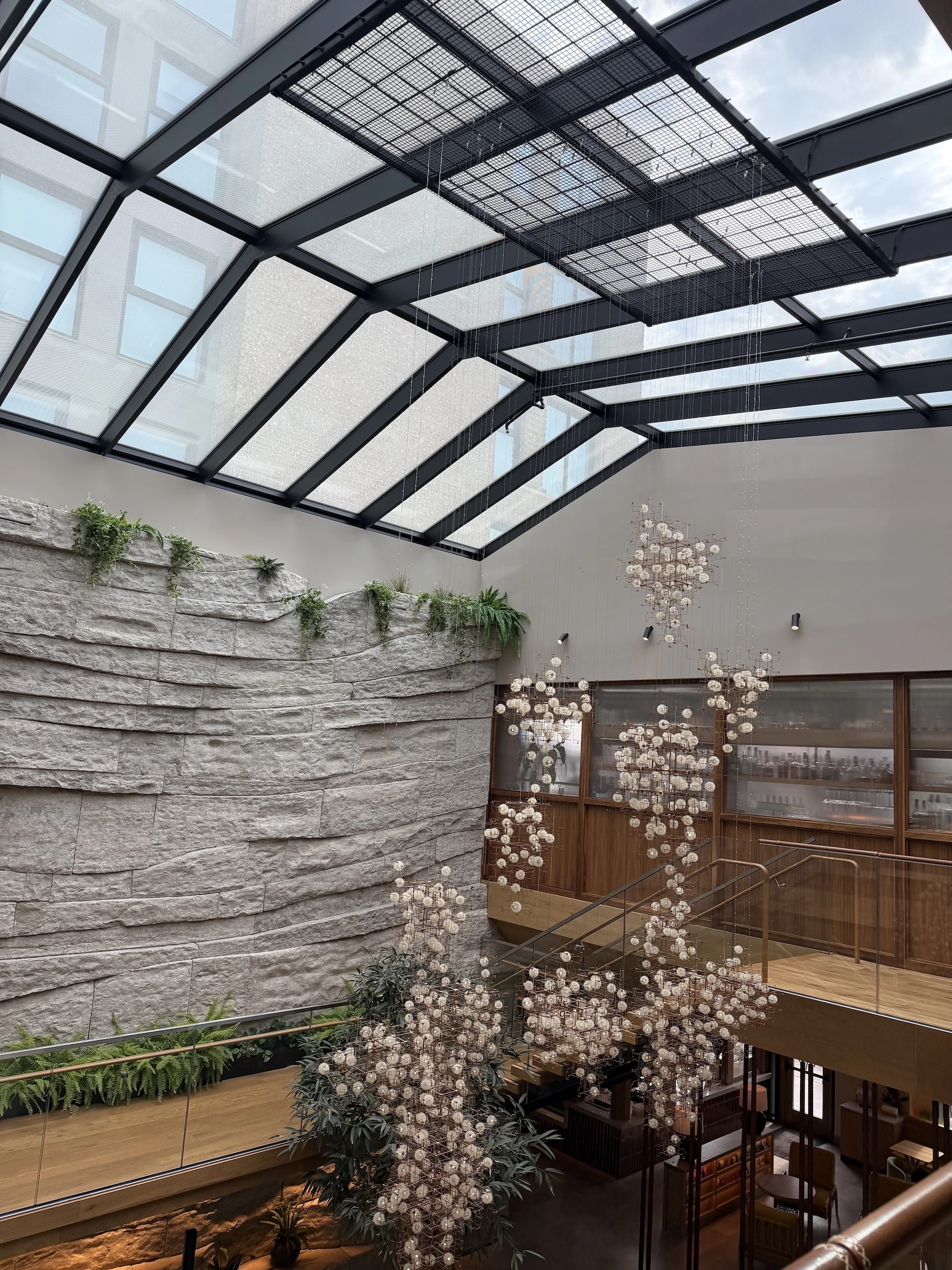 The gorgeous, flower-filled atrium inside The Compton