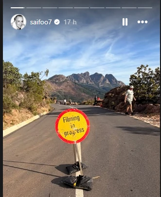 Saif shared a photo of a mountain road with a &ldquo;filming in progress&rdquo; sign. 