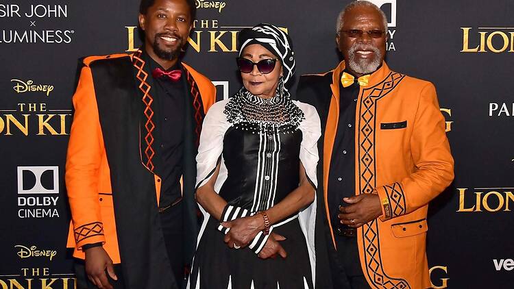 Jonh Kani and his son Atandwa with the family matriarch who has stood by the cultural icon's side for many decades. Jonh Kani and his son Atandwa with the family matriarch who has stood by the cultural icon's side for many decades.