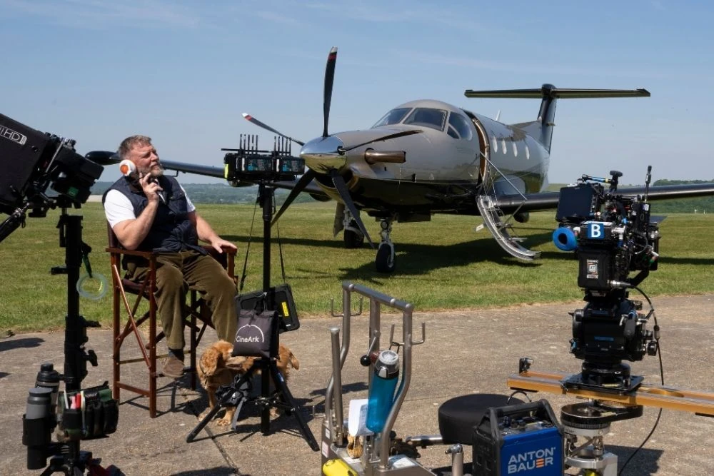 Guy Ritchie filming The Gentlemen season 2 on an airfield