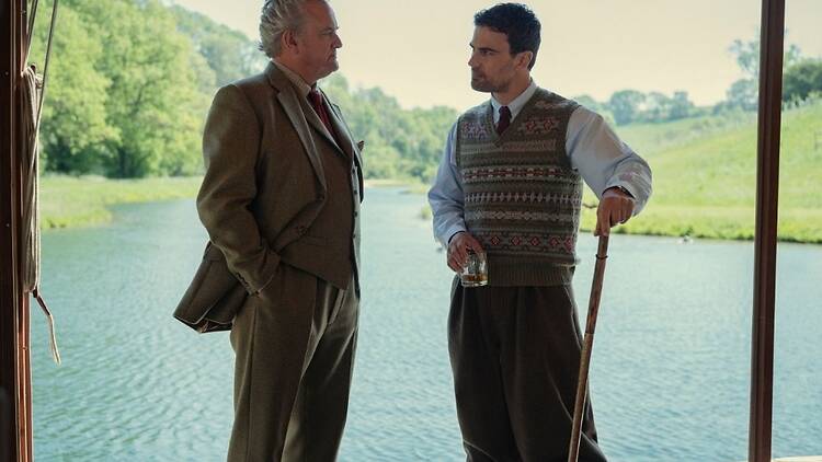 Hugh Bonneville and Theo James at Guy Ritchie's Ashcombe House in a still from The Gentlemen season 2. 
