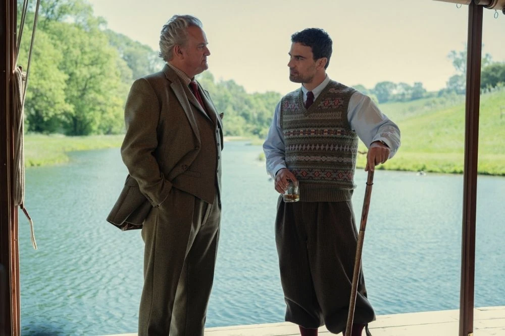 Hugh Bonneville and Theo James at Guy Ritchie's Ashcombe House in a still from The Gentlemen season 2. 