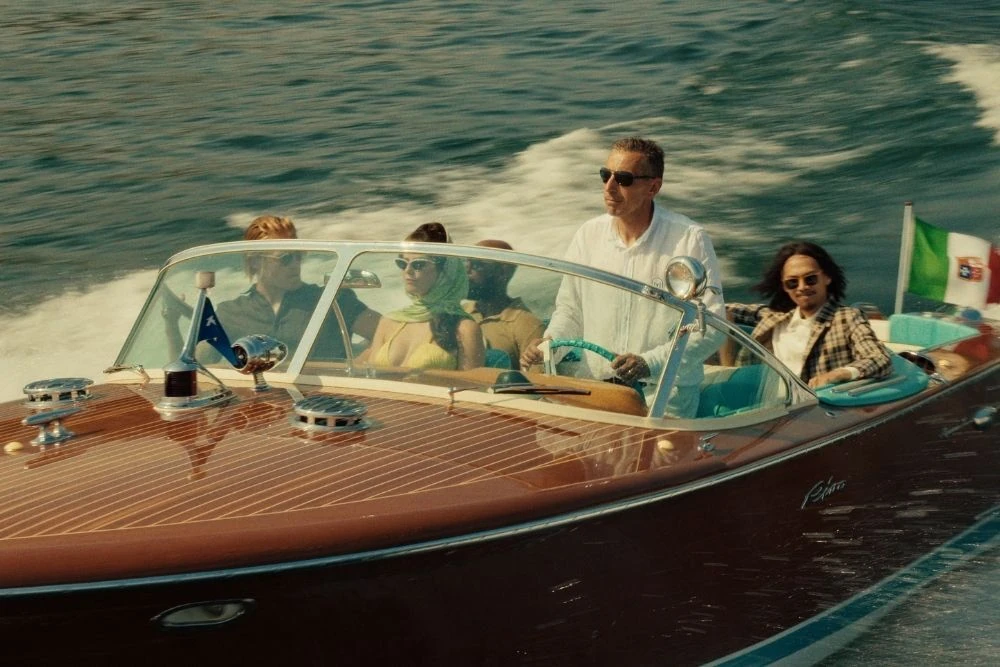 The Gentlemen characters at Lake Maggiore in a still from The Gentlemen season 2. 