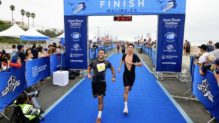 Zuma Beach Triathlon Runners at the finish line of the Zuma Beach Triathlon.