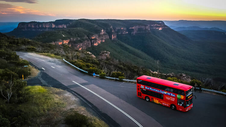 Blue Mountains Explorer Bus The Blue Mountain Explorer Bus driving on a scenic road