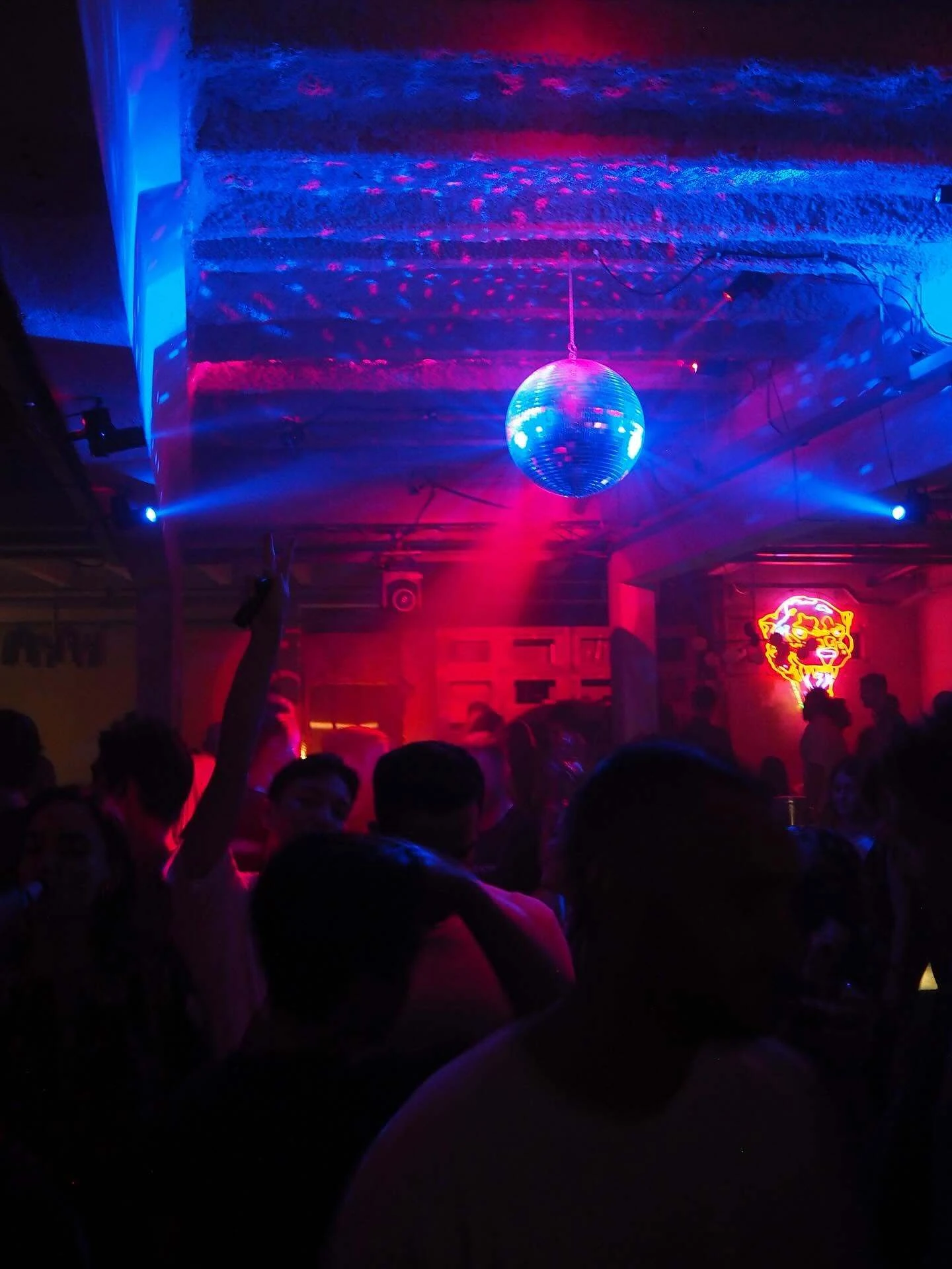 Dark bar with disco ball in Bangkok
