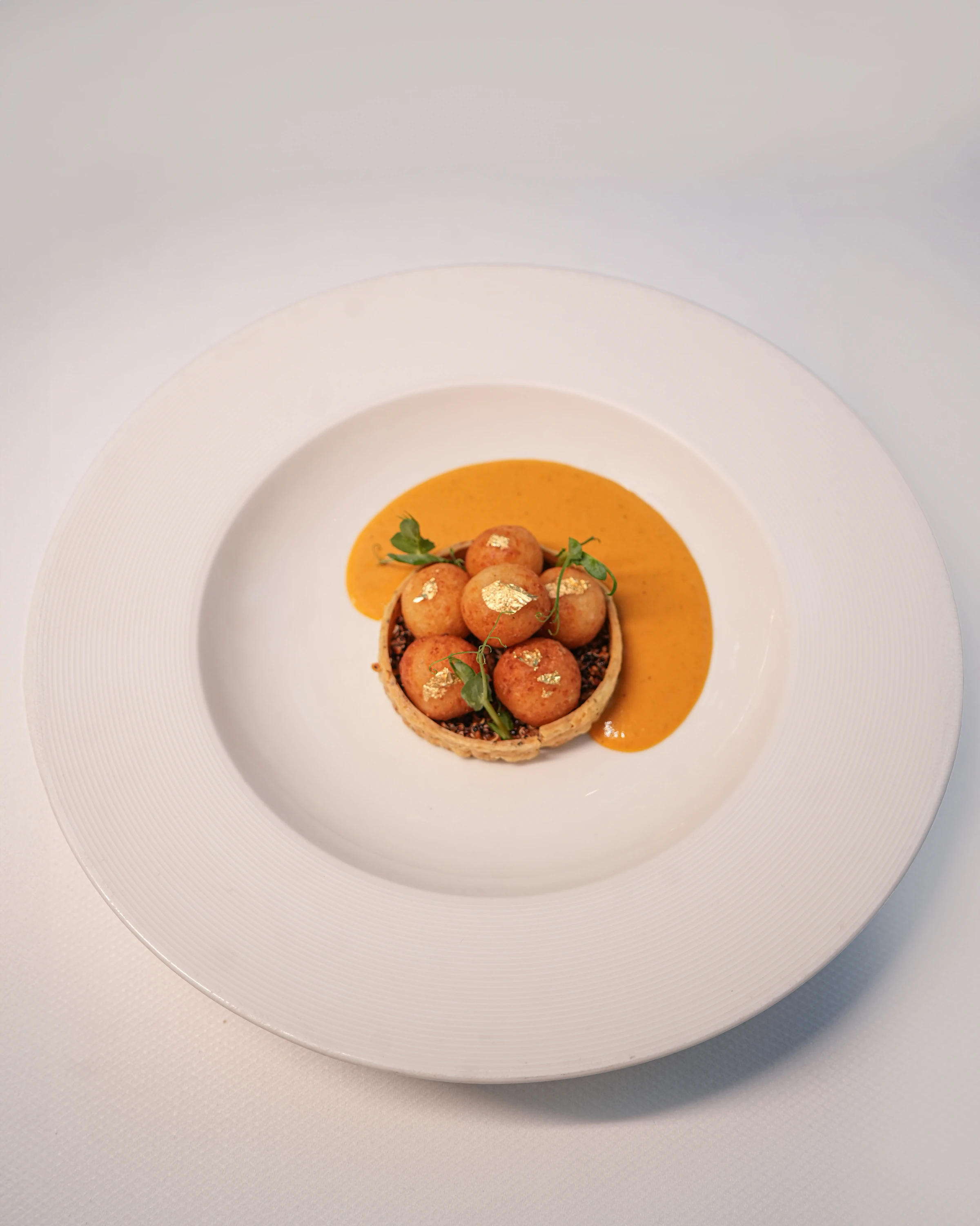 Malai kofta, five spice squash curry, and quinoa at Indian Accent