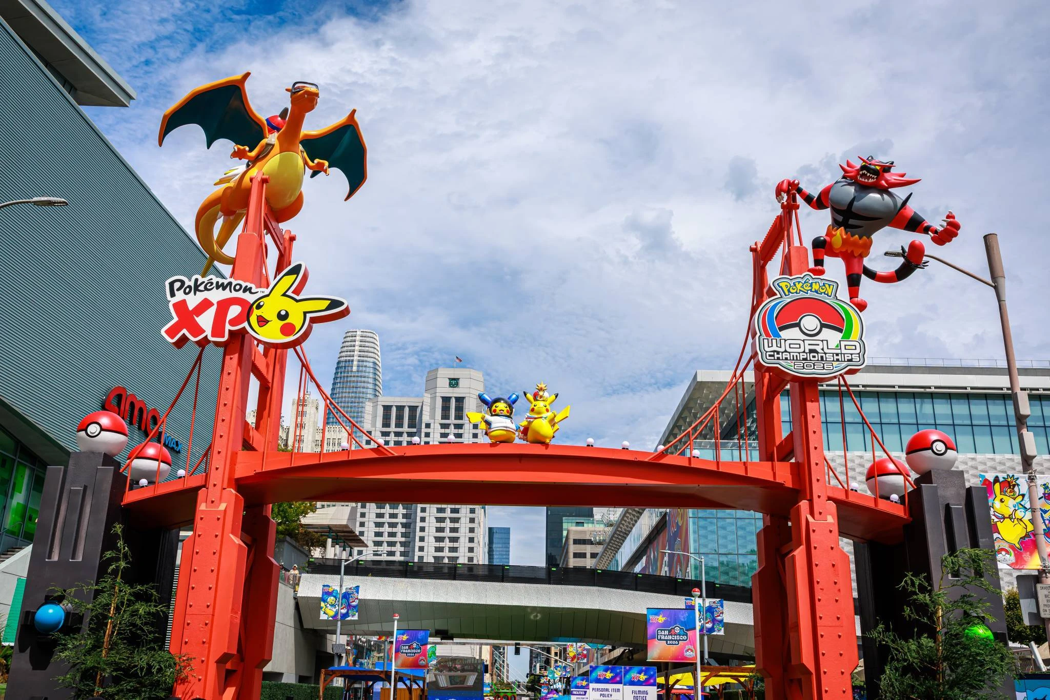 Charizard, Pikachu and Incineroar atop the entrance to Pok&eacute;monXP in San Francisco