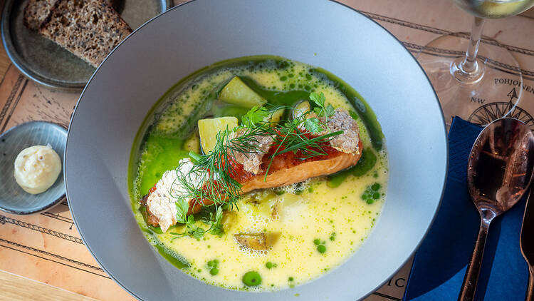 Big juice slice of salmon on a soup