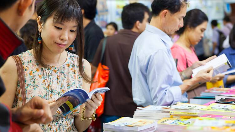 Attendees at a book fair Attendees at a book fair