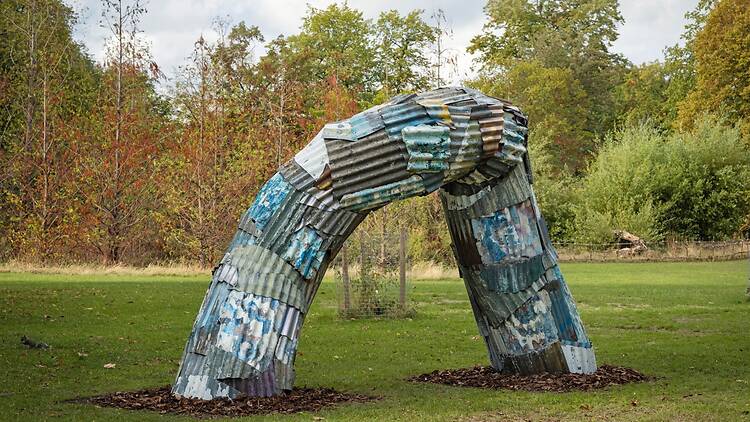 Wormlike sculpture made of discarded materials in Regent's Park Wormlike sculpture made of discarded materials in Regent's Park