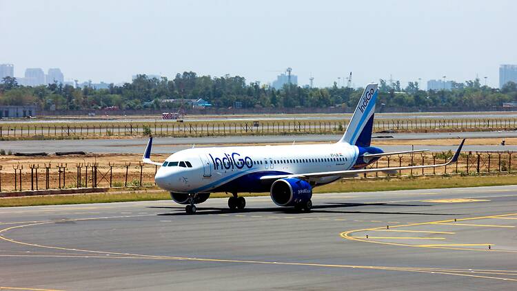 An indigo commercial flight on the runway An indigo commercial flight on the runway